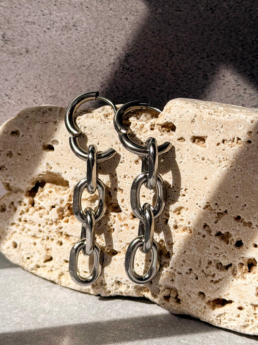 Silver chain link detail on hoop earring