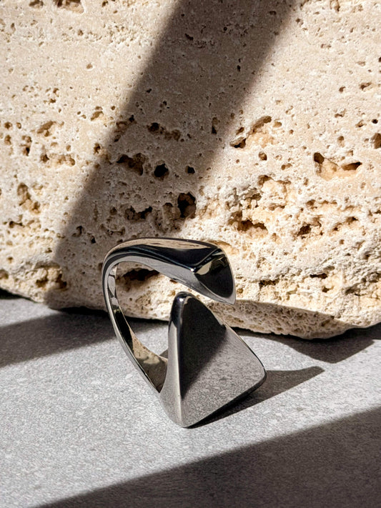 Polished silver ring with dual triangular ends