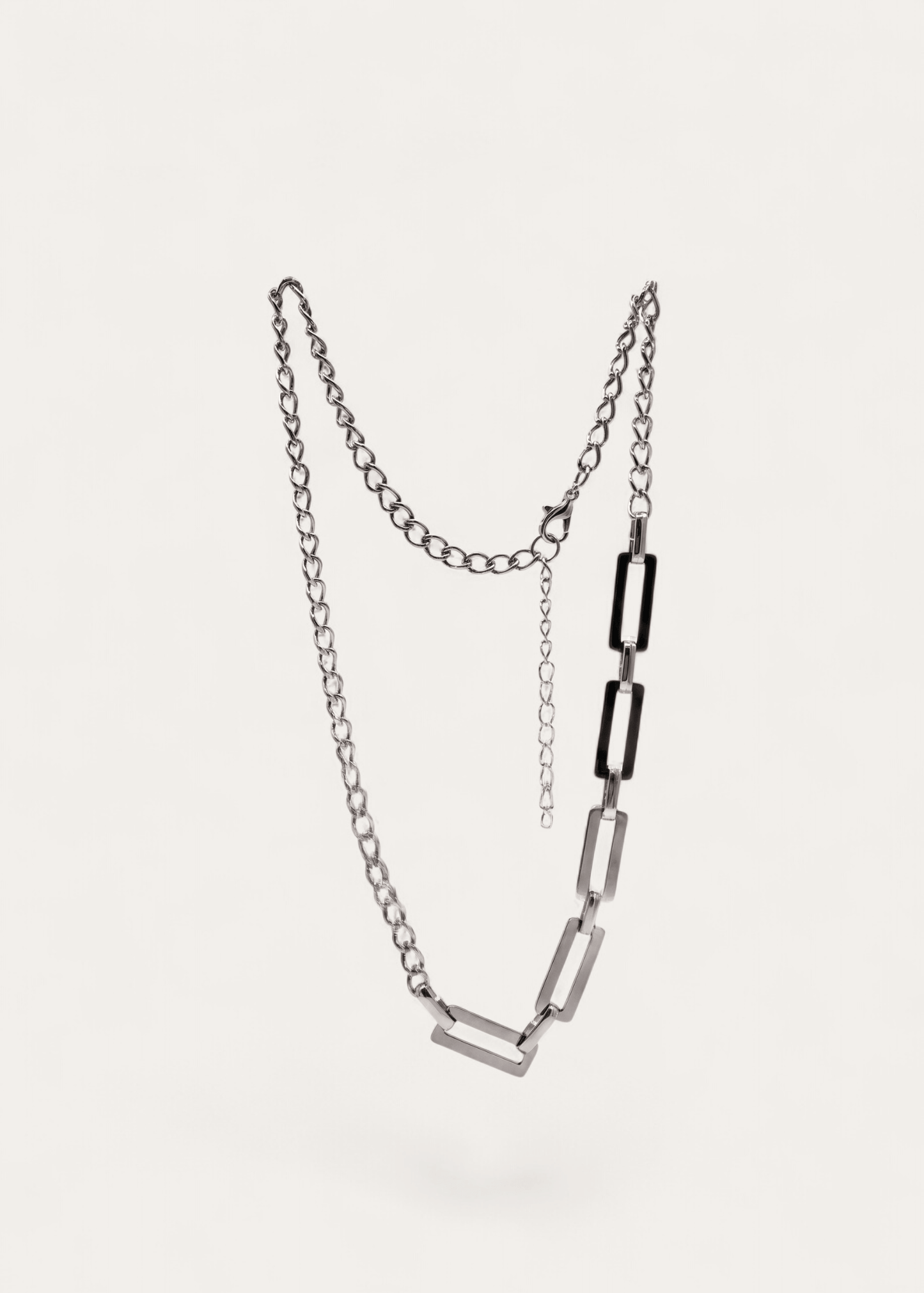 Asymmetric silver necklace with mixed curb and rectangular links