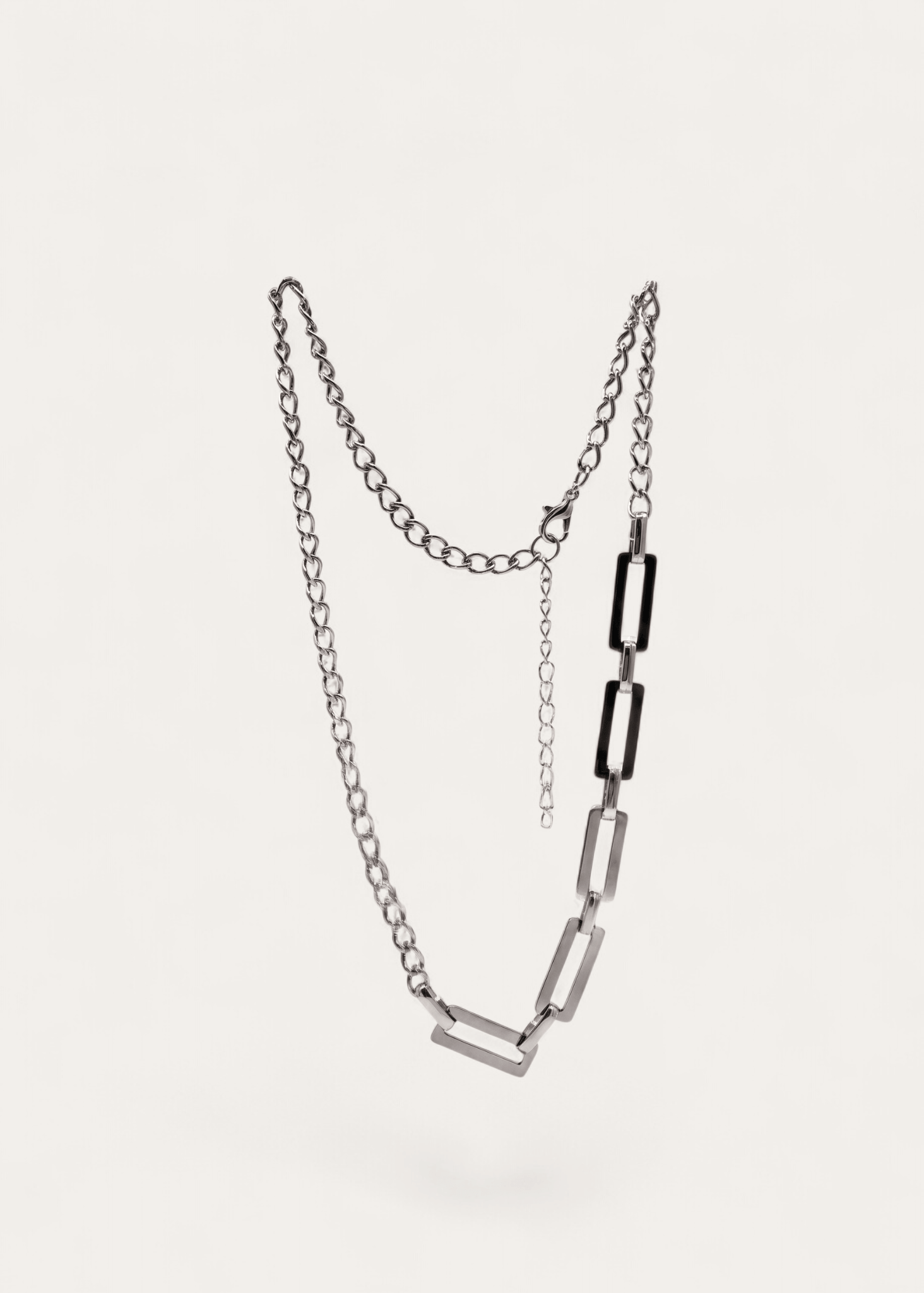 Asymmetric silver necklace with mixed curb and rectangular links