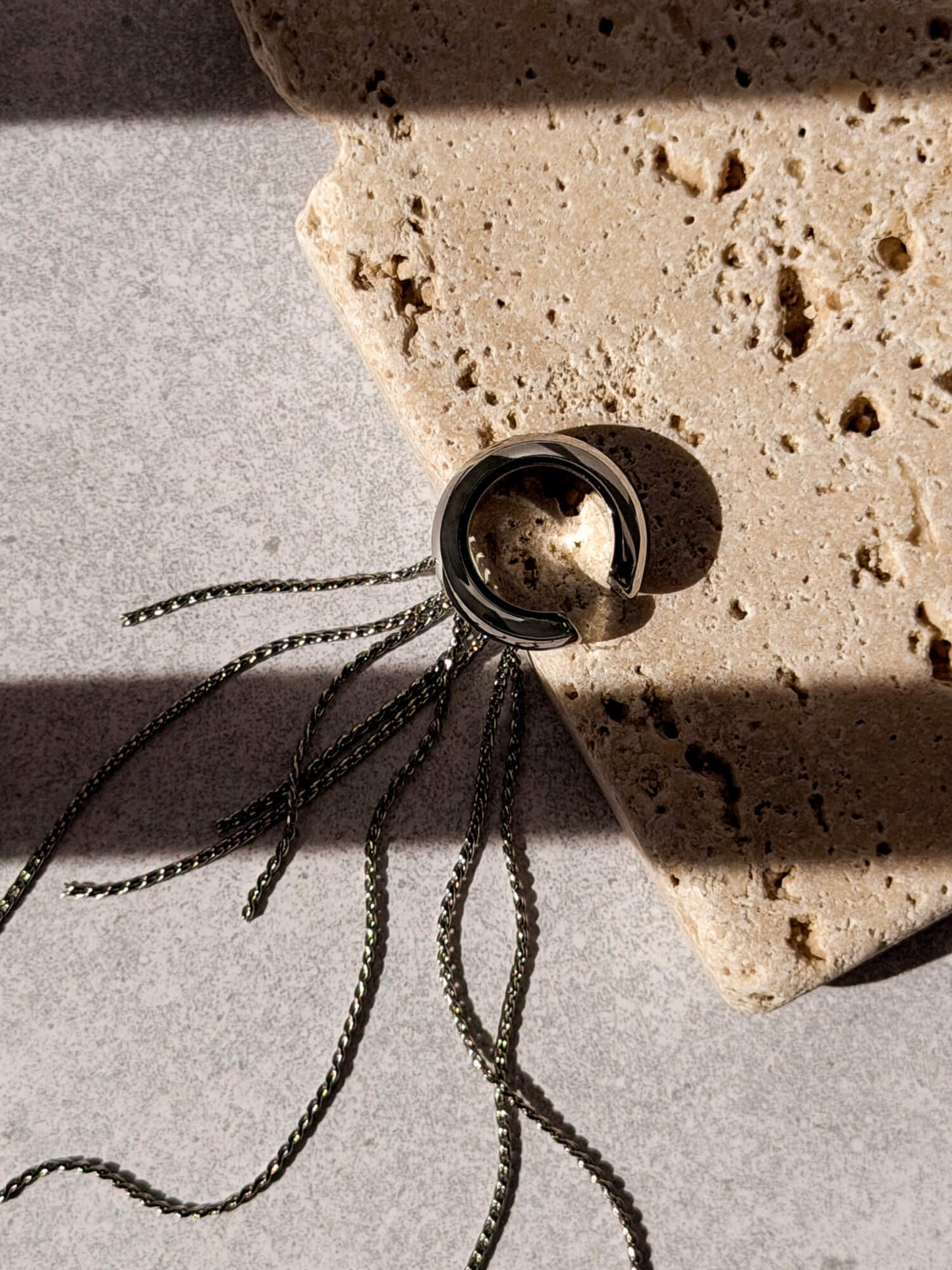 Cascade silver ear cuff, top-down view