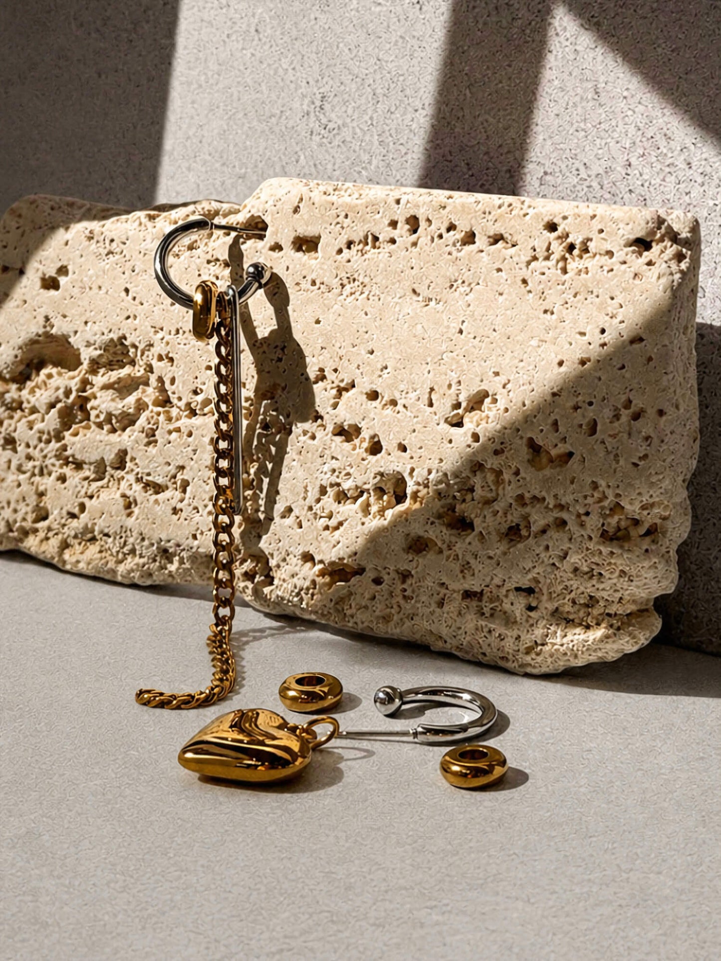 Gold and silver drop earrings, chain and heart design