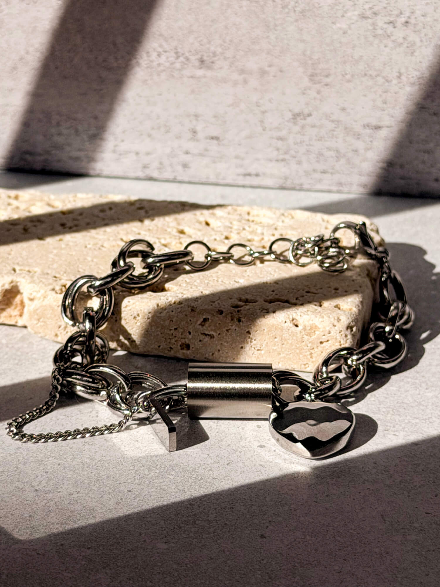 Chunky silver curb chain bracelet, hammered heart detail