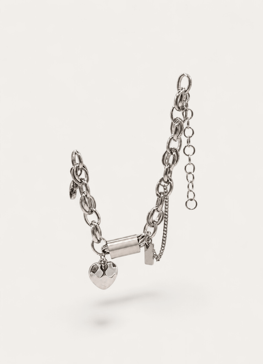 Silver chain bracelet with heart charm and toggle clasp