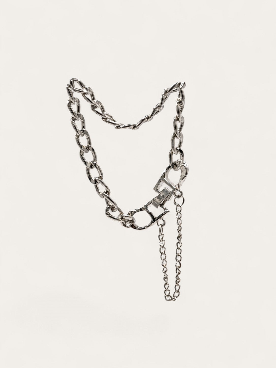 Layered hardware silver bracelet with curb chain and toggle clasp