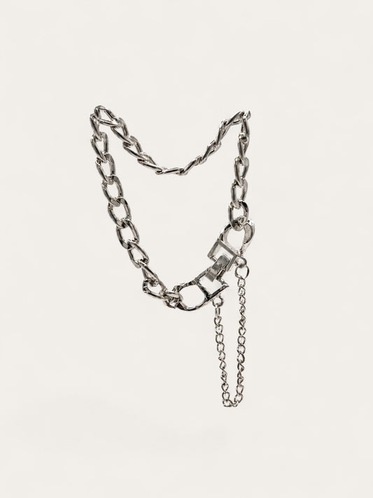 Layered hardware silver bracelet with curb chain and toggle clasp