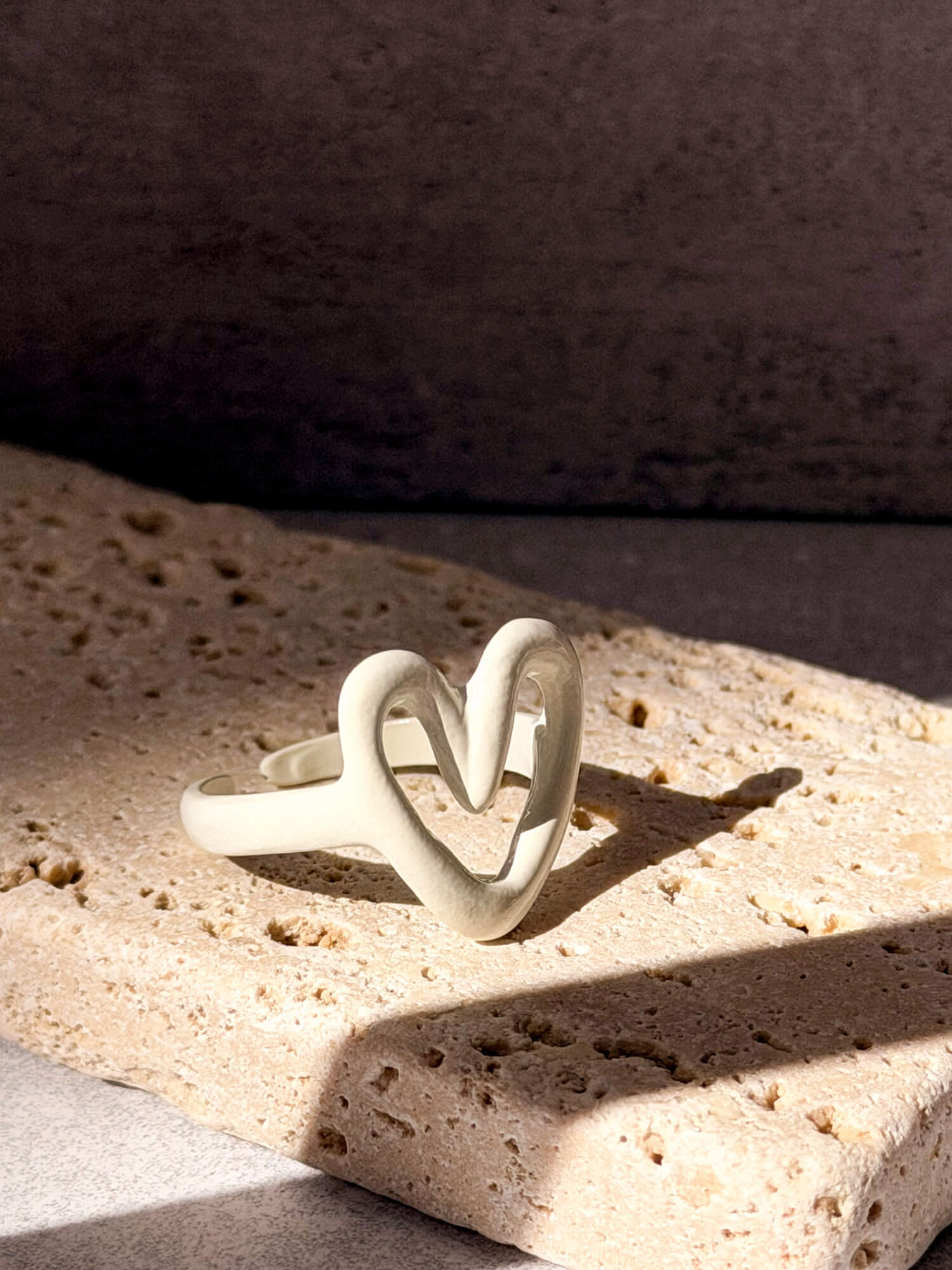 Ivory heart-shaped ring, open band design
