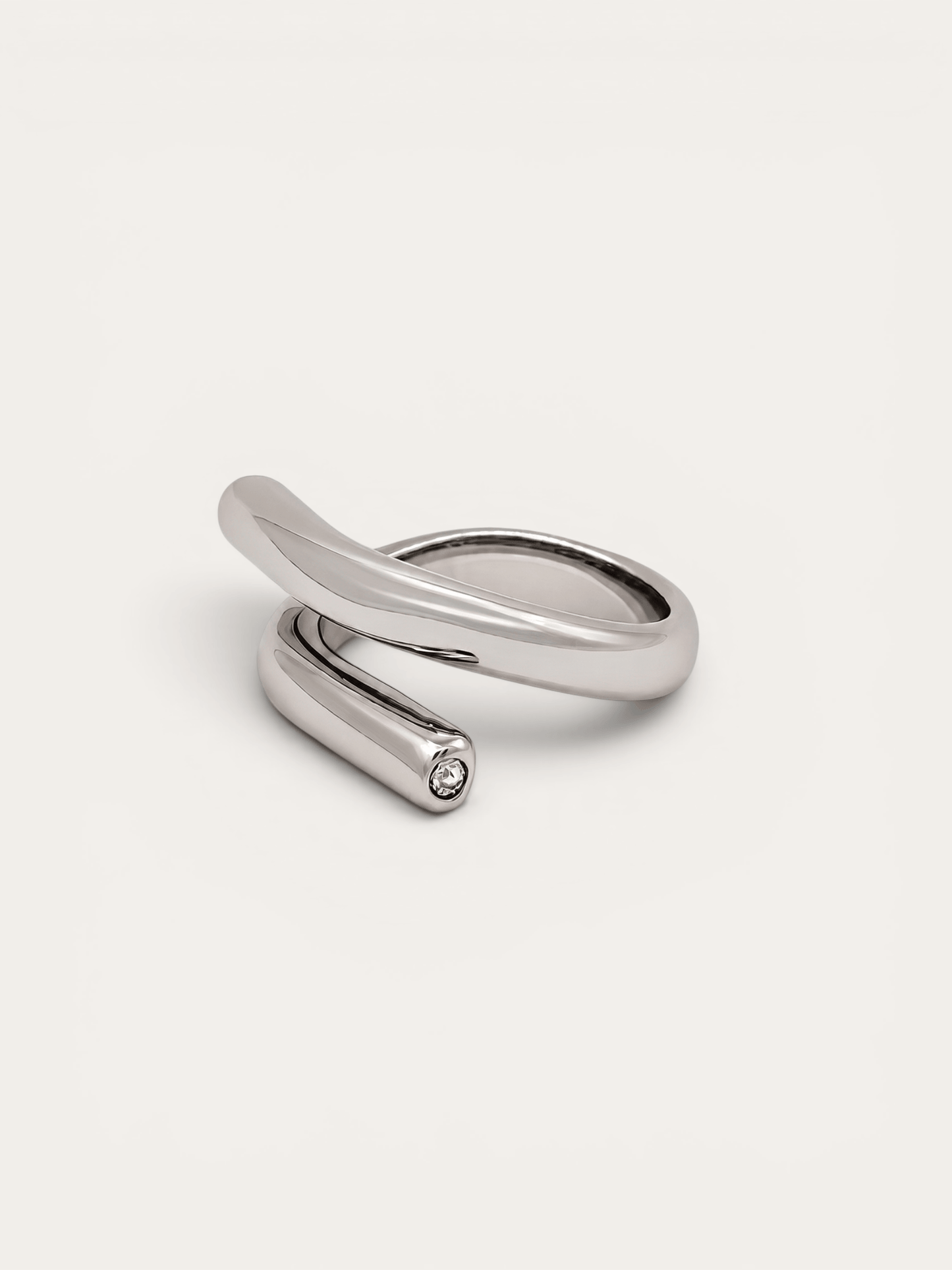 Sculptural wrap silver ring with crystal accent